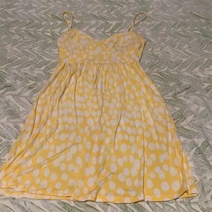 Mini yellow and white polka dot summer dress